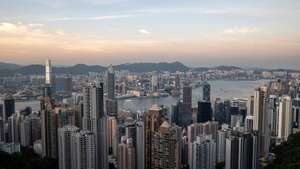 epa10101310 View of residential and commercial buildings in Hong Kong, China, 01 August 2022. Hong Kong has fallen into recession as the economy has shrunk by 1.4 per cent in the second quarter according to government figures.  EPA/JEROME FAVRE