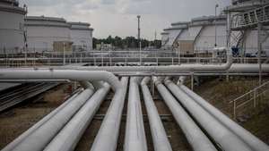 epa10122977 A view of storage tanks and pipelines at the Central oil tank farm operated by Mero CR near Nelahozeves, Czech Republic, 15 August 2022. Mero CR owns and operates the Czech part of the Druzhba pipeline and the IKL pipeline, is the sole transporter of crude oil to the Czech Republic, and also provides storage for the Czech emergency strategic oil reserves. Both pipelines enter the Central oil tank farm near Nelahozeves, where the company has built a total of 17 oil tanks with a total storage capacity of 1 675 000 m3. In June 2022, the European Union approved a sixth package of sanctions over Russia's invasion of Ukraine, which includes a ban on most Russian oil imports from the turn of the year. Oil transport via the Druzhba pipeline supplying the Czech Republic, Slovakia and Hungary will be temporarily excluded from the embargo.  EPA/MARTIN DIVISEK
