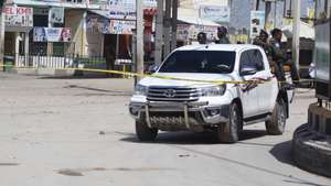 epa10130103 Somali security officials arrive at the scene of an attack at the Hayat Hotel in Mogadishu, Somalia, 20 August 2022. According to Somaliaâ€™s security officials, at least 10 people were killed in the attack reportedly carried out by al-Shabab militants on 19 August. The attack involved explosions outside the hotel and gunfire.  EPA/SAID YUSUF WARSAME