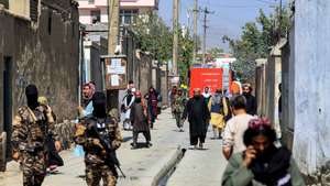 epa10215539 Taliban stand guard at the scene of a bomb blast in Kabul, Afghanistan, 30 September 2022. At least 19 people were killed and another 27 injured after a powerful explosion occurred at a school in a Shia Hazara neighborhood in western Kabul on 30 September, police said. No terrorist outfit has claimed responsibility for the attack so far although the Islamic State (IS) terror group has traditionally targeted this minority.  EPA/STRINGER