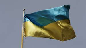 epa09867027 A picture taken 01 April 2022 of an Ukranian flag in the Odessa Internat Center for Invalid Kids, a place where women are sewing national  flags and balaclavas for military checkpoints instead of the usual tipical clothes, in Odesa, Ukraine, issued 03 April 2022. On 24 February Russian troops had entered Ukrainian territory in what the Russian president declared a 'special military operation', resulting in fighting and destruction in the country, a huge flow of refugees, and multiple sanctions against Russia.  EPA/NUNO VEIGA