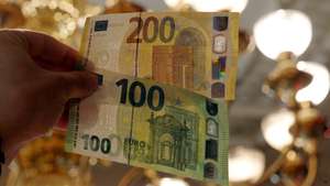 epa07596701 A view of new euro banknotes in Riga, Latvia, 24 May 2019. Latvia will be launching new 100 euro and 200 euro banknotes On 28th May 2019. These are the latest European series of banknotes with refurbished design and advanced security features.  EPA/Toms Kalnins