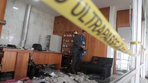 epa10396802 Officials inspect the damage to the Planalto Palace after Bolsonaro supporters took over the Plaza de los Tres Poderes (Square of the Three Powers) to invade government buildings, in Brasilia, Brazil, 09 January 2023. Hundreds of supporters of former Brazilian President Jair Bolsonaro on 08 January invaded the headquarters of the National Congress, and also Supreme Court and the Planalto Palace, seat of the Presidency of the Republic, in a demonstration calling for a military intervention to overthrow President Luiz Inacio Lula da Silva. The crowd broke through the cordons of security forces and forced their way to the roof of the buildings of the Chamber of Deputies and the Senate, and some entered inside the legislative headquarters. So far, authorities detained some people involved in the violent acts which were widely condemned by all Brazilian institutions and by the international community.  EPA/ANDRE COELHO