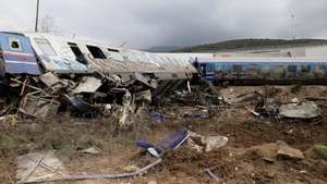 epa10497106 Destroyed train wreckege after a collision near Larissa city, Greece, 01 March 2023. Fire fighter and ambulance service crews remain at the scene, while special crews were using cutting tools and blow torches to cut and prise apart the remains of the carriages to look for people or bodies possibly trapped inside. According to the latest update by the fire brigade spokesperson Vasilis Vathrakogiannis, the death toll was 36 so far and 66 people had been taken to hospital, six of which were admitted to ICUs.  EPA/ACHILLEAS CHIRAS