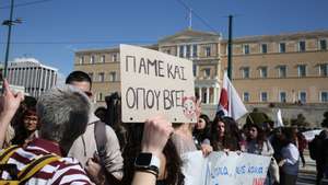 epa10500653 Youths hold banners during a protest in Athens, over the deadly train crash near the city of Larissa, Greece, 03 March 2023. The number of confirmed dead from the train collision at Tempi is 57, Hellenic Police press spokesperson Konstantia Dimoglidou announced on 03 March morning. The collision occurred late on 28 February night near Tempi in central Greece between a passenger train travelling north and a freight train travelling south on the same line. A station master in the central Greek city of Larissa has been detained over the accident.  EPA/ALEXANDROS BELTES