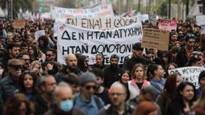 epa10526193 Protesters carry placards during a nationwide 24-hour strike following a deadly train crash, in Athens, Greece, 16 March 2023. Greece&#039;s private and public sector unions called for a 24-hour nationwide strike demanding that liabilities be assigned to those responsible for the fatal Tempi train collision on February 28.  EPA/GEORGE VITSARAS