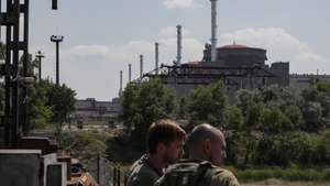 epa10693169 A picture taken during a visit to Enerhodar organised by the Russian Defence ministry shows a general view of the Zaporizhzhia Nuclear Power Plant in Enerhodar, southeastern Ukraine, 15 June 2023. The Zaporizhzhia Nuclear Power Plant can still continue to draw water from the Kakhovka reservoir, the IAEA reports. Grossi said that after the destruction of the Kakhovka hydroelectric power station, a situation may arise when the water from the Kakhovka reservoir will not be enough to cool the reactors of the Zaporozhye nuclear power plant. According to him, in this case, the reactors can be damaged, which threatens with the onset of radiological consequences. The water level in the reservoir near the Zaporizhzhya TPP has dropped to 11.27 meters and continues to decline.  EPA/SERGEI ILNITSKY
