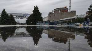 epa10692609 A picture taken during a visit to Enerhodar organised by the Russian Defence ministry shows a general view of the Zaporizhzhia Nuclear Power Plant in Enerhodar, southeastern Ukraine, 14 June 2023. The Zaporizhzhia Nuclear Power Plant can still continue to draw water from the Kakhovka reservoir, the IAEA reports. Grossi said that after the destruction of the Kakhovka hydroelectric power station, a situation may arise when the water from the Kakhovka reservoir will not be enough to cool the reactors of the Zaporozhye nuclear power plant. According to him, in this case, the reactors can be damaged, which threatens with the onset of radiological consequences. The water level in the reservoir near the Zaporizhzhya TPP has dropped to 11.27 meters and continues to decline.  EPA/SERGEI ILNITSKY PICTURE MADE AVAILABLE TODAY