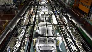 epa10826362 (FILE) - Workers check the surface of vehicles at the Toyota Tsutsumi car assembly plant in Toyota, near Nagoya, central Japan, 08 December 2017 (reissued 29 August 2023). Toyota Motor Corporation announced on 29 August 2023 that production lines at 12 plants in Japan had been shut down since the morning due to a failure in the automaker's computer system managing parts orders. Additional lines at two other plants are also scheduled to stop production in the evening, causing the suspension of all vehicle production in Japan. The cause is under investigation.  EPA/FRANCK ROBICHON