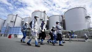 epa10823029 Foreign journalists are guided along with tanks containing treated radioactive wastewater, part of the facility for the releasing treated radioactive water to sea from the Fukushima Daiichi nuclear power plant, operated by Tokyo Electric Power Company Holdings, also known as TEPCO, in Okuma town, northeastern Japan, 27 August 2023. On 24 August in the early afternoon, plant operator Tokyo Electric Power Company Holdings Inc. (TEPCO) started the discharge of treated radioactive water from the Fukushima nuclear power plant into the Pacific Ocean despite opposition of local fishermen and some neighboring countries. It shall take as long as 30 years to complete the release of the treated radioactive water from more than 1,000 tanks.  EPA/EUGENE HOSHIKO / POOL