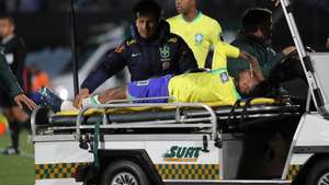 epaselect epa10924731 Brazil&#039;s Neymar reacts while being assisted to leave the field for a possible injury during a CONMEBOL FIFA World Cup 2026 qualifier soccer match between Uruguay and Brazil at Centenario stadium in Montevideo, Uruguay, 17 October 2023.  EPA/Raul Martinez