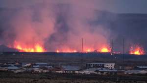 epaselect epa11077207 Lava explosions and rising smoke after a volcanic eruption near the town of Grindavik, in the Reykjanes peninsula, southwestern Iceland, 14 January 2024. A volcanic eruption began north of the town of Grindavík on the Reykjanes peninsula on 14 January, prompting authorities in Iceland to evacuate the small fishing town in the early morning as a precaution. The eruption is not expected to impact additional populated areas and does not present a 'threat to life', the Government of Iceland stated, adding that there are no disruptions to flights to and from Iceland. This is the second eruption in the area since December 2023, and the fifth since 2021.  EPA/ANTON BRINK