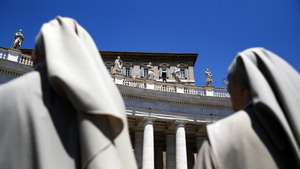 epa11447019 Nuns gather to attend the Angelus prayer led by Pope Francis from the window of his office overlooking Saint Peter&#039;s Square, Vatican City, 30 June 2024.  EPA/ANGELO CARCONI