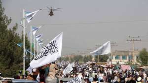 epa11548690 Supporters of Taliban authorities mark the third anniversary of the Afghan government takeover in Kandahar, Afghanistan, 14 August 2024. The Taliban seized control of Kabul on 15 August 2021, following the collapse of the US-backed government amidst the chaotic withdrawal of foreign troops. Despite their consolidation of power and claims of improved security, the Taliban government remains unrecognized internationally, facing criticism for severe restrictions on women and a worsening humanitarian crisis affecting 23.7 million Afghans in need of assistance.  EPA/QUDRATULLAH RAZWAN