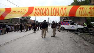 epa11550922 Pakistani security officials inspect the scene of an explosion of an improvised explosive device (IED) targeting a police vehicle, in Peshawar, Pakistan, 16 August 2024. At least five people including two policemen were injured in an explosion targeting police personnel and took place on Peshawar&#039;s Warsak Road in the Pir Bala area, police and hospital officials said. Superintendent of Police Warsak Division Muhammad Arshad Khan said the Machnigate Police Station&#039;s vehicle was on routine patrol when the bomb exploded. The rise in insurgent attacks, particularly in Khyber Pakhtunkhwa and Balochistan, has been linked to the Taliban&#039;s resurgence in Afghanistan, with Pakistan accusing the Afghan government of harboring militant groups.  EPA/ARSHAD ARBAB