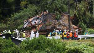 epa11568065 Rescue workers search for missing residents living at a house collapsed by heavy rain triggered by typhoon Yanyan, in Gamagori, Aichi Prefecture, central Japan, 28 August 2024. Two members of a five-person family buried by the landslide were rescued. The Japan Meteorological Agency stated on 28 August 2024 that it may issue a special warning for strong winds, high waves, high tides and heavy rain for southwestern Japan as typhoon Yanyan approaches Kagoshima Prefecture. The agency also announced the typhoon is expected to cause immense damage all over Japan as it is expected to course along Japanese islands. The typhoon will suspend Japan&#039;s Shinkansen bullet train services and airlines already announced the cancellation of about 200 flights.  EPA/JIJI PRESS JAPAN OUT EDITORIAL USE ONLY/