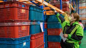 epa10361630 A workers inspects different fruits crates inside a fruit processing facility in New Taipei City, Taiwan, 12 December 2022. According to Taiwan Premier Su Tseng-chang on 10 December 2022, Taiwan may take China to the World Trade Organization after Beijing imposed more import ban of Taiwanese food and drink products.  EPA/RITCHIE B. TONGO