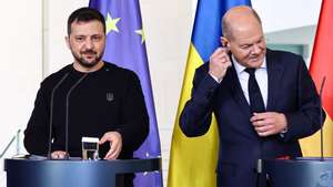 epa11654707 Ukrainian President Volodymyr Zelensky (L) and German Chancellor Olaf Scholz (R) attend a press statement during their meeting at the Chancellery in Berlin, Germany, 11 October 2024. Zelensky is on a visit to Germany after visiting France and Italy.  EPA/FILIP SINGER