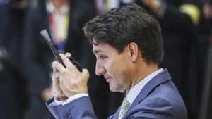 epa11652436 Canada&#039;s Prime Minister Justin Trudeau adjusts his headphone during the ASEAN-Canada Special Summit on Enhancing ASEAN Connectivity and Resilience as part of the 44th and 45th ASEAN Summits and Related Summits at the National Convention Center in Vientiane, Laos, 10 October 2024. Leaders of the Association of Southeast Asian Nations (ASEAN) convene at a summit hosted by Laos in the capital of Vientiane to tighten the diplomatic ties and discuss the ongoing civil unrest in Myanmar and a tension in the South China Sea.  EPA/RUNGROJ YONGRIT