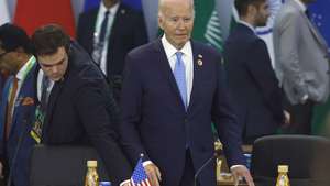 epa11727527 US President Joe Biden (C) takes part in the opening of the G20 Summit of Heads of State, in Rio de Janeiro, Brazil, 18 November 2024. The G20 summit will bring together leaders from 55 nations and organizations on 18 and 19 November at the Museum of Modern Art in Rio de Janeiro.  EPA/ANTONIO LACERDA