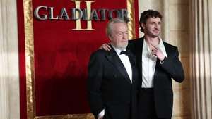 epa11719236 British director Sir Ridley Scott (L) and Irish actor Paul Mescal attend the Royal film performance and global premiere of 'Gladiator II' in central London, Britain, 13 November 2024. The movie opens in British cinemas on 15 November 2024.  EPA/ANDY RAIN