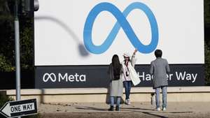 epa11757744 People take photos at the Meta signage in front of the Meta Platforms (Meta) headquarters in Menlo Park, California, USA, 04 December 2024. Meta Platforms stock hits a 52-week high, up 73.3 percent year to date (YTD). CEO Mark Zuckerberg announced to ramp up AI investments into next year.  EPA/JOHN G. MABANGLO