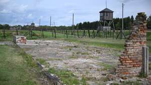 epa11560139 A view of the German Nazi extermination camp Majdanek during the celebration commemorating the 80th anniversary of its liquidation in Lublin, eastern Poland, 22 August 2024. On 22 July 1944, about 800 people were escorted from Majdanek by SS officers. After a few days of march, they were embarked on a train to Auschwitz.  EPA/WOJTEK JARGILO POLAND OUT