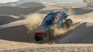 epa11810191 Portuguese driver Joao Ferreira and Portuguese co-driver Filipe Palmeiro drive their Mini JCW Rally 3.0D for the X-RAID MINI JCW Team during the second stage of the 2025 Dakar Rally, in Bisha, Saudi Arabia, 06 January 2025.  EPA/Marie Hessel