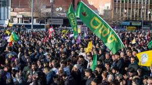 epa11928271 Supporters of Turkish pro-Kurdish Peoples' Equality and Democracy Party (DEM) gather to watch on a screen a press conference of a DEM delegation following their visit to jailed Kurdistan Workers' Party (PKK) leader Abdullah Ocalan, in Diyarbakir, Turkey, 27 February 2025. At the press conference of the DEM on 27 February, a letter from the imprisoned PKK militant leader was read, in which Abdullah Ocalan called on the Kurdish group to lay down their arms.  EPA/STRINGER