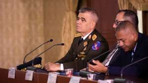 epa11023707 Venezuela Defense Minister Vladimir Padrino Lopez (L) takes part in a meeting of the High Commission for the Defense of Guayana Esequiba, in Caracas, Venezuela, 11 December 2023. Venezuela installed the 'High Commission for the Defense of Guayana Esequiba', which will prepare a proposal that will be presented by President, Nicolas Maduro at his meeting with his Guyanese counterpart, Irfann Ali, with whom he will address on 14 December, in Saint Vincent and the Grenadines, the territorial dispute that both countries maintain and that has escalated in recent days. The controversy grew worse after Venezuela approved a unilateral referendum annexing the Essequibo region, so the Maduro Government ordered the settlement of a military division near the disputed area, without incursions for now.  EPA/RAYNER PENA R