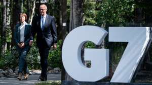 epa12179466 Chancellor of Germany Friedrich Merz (R) and his wife Charlotte Merz (L) arrive during the first day of official events at the G7 Leaders' Summit at the Pomeroy Kananaskis Mountain Lodge, in Kananaskis, Alberta, Canada, 16 June 2025.  EPA/SPENCER COLBY