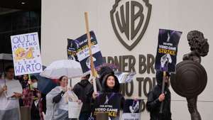 epaselect epa11943189 Members of SAG-AFTRA (Screen Actors Guild-American Federation of Television and Radio Artists) display placards while participating in a picket outside WB Games Inc. in Burbank, California, USA, 05 March 2025. Members of SAG-AFTRA have been on strike since July 2024 against video game companies that signed the Interactive Media Agreement over AI protections for voice and motion performers.  EPA/ALLISON DINNER