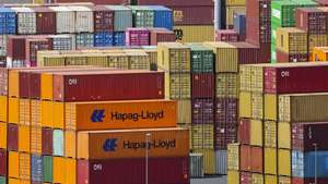 epa12022794 Shipping containers are stacked at the Duisport in Duisburg, Germany, 10 April 2025. US President Trump on 09 April has paused for 90 days the implementation of higher tariffs announced on 02 April for most countries, except China whose tariff has increased to 125 percent.  EPA/CHRISTOPHER NEUNDORF