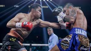 epaselect epa12248686 Manny Pacquiao (L) of the Philippines in action against Mario Barrios (R) of the USA during their WBC Welterweight Championship bout at the MGM Grand Garden Arena in Las Vegas, Nevada, USA, 19 July 2025.  EPA/ALLISON DINNER