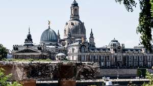 epa12210922 A general view of the demolition work of the Carola Bridge at the historical part of central Dresden, Germany, 02 July 20225. In the early hours of 11 September 2024, a roughly 100‑meter portion of the western span of the Carola Bridge over the Elbe collapsed due to long-term corrosion in its prestressed concrete tendons. Since June 2025, demolition work has been underway on the remaining unsafe sections, with full removal expected by September and plans to rebuild a new crossing as soon as 2027.  EPA/Filip Singer