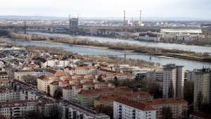 epa09070082 A general view of Vienna’s Kaisermuehlen neighbourhood and the Danube river (Donau) is seen from the IAEA headquarters of the UN seat in Vienna, Austria, 12 March 2021.  EPA/CHRISTIAN BRUNA