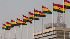 epa11811279 Ghanaian flags flutter during the inauguration ceremony of Ghanaian President John Dramani Mahama at the Black Star Square in Accra, Ghana, 07 January 2024. Mahama of the National Democratic Congress (NDC) swept back to power after eight years in opposition and defeated Vice President Bawumia and managed to secure a majority in parliament, winning 183 seats out of 276.  EPA/CHRISTIAN THOMPSON