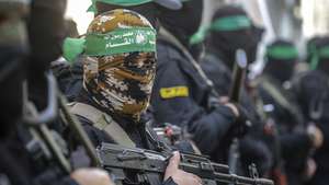 epa11874922 Fighters of the Al-Qassam Brigades, the military wing of Hamas, attend the funeral of late Hamas military commander Ghazi Abu Tamaa, head of Hamas' Administrative and Combat Support Staff, in Deir al-Balah refugee camp, southern Gaza Strip, 04 February 2025. Israel and Hamas implemented the first phase of a hostage release and ceasefire deal on 19 January 2025.  EPA/MOHAMMED SABER