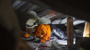 epa12415912 A rescuer searches for survivors of a collapsed building at an Islamic boarding school in Sidoarjo, East Java, Indonesia, 30 September 2025. Dozens of students were injured, and others are feared to be trapped, after a prayer hall collapsed while students were performing the afternoon prayer at the Al-Khoziny Islamic boarding school in East Java on 29 September.  EPA/FULLY HANDOKO