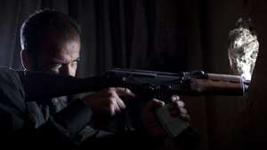 epa12241113 (FILE) - A Syrian rebel fighter aims his weapon towards regime positions at the Saif Al-Dawla front line in Aleppo, Syria, 19 September 2013 (reissued 16 July 2025). Bashar al-Assad assumed power at the age of 34, following the death of his father, Hafez al-Assad, in 2000. Bashar al-Assad's 25 years of rule profoundly marked Syria's political landscape, leaving a country marked by deep authoritarianism, sectarian division, institutional decay and a civil war recognized as one of the world's worst humanitarian crises.  EPA/JM Lopez *** Local Caption *** 51005779