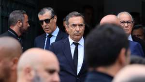 Reinaldo Teixeira (C), president of the Portuguese Soccer League, attends the funeral of former FC Porto captain Jorge Costa at Cristo Rei church, in Porto, Portugal, 07 August 2025. Porto’s football director Jorge Costa died aged 53, after a cardiac arrest at Porto’s training ground, the club announced on 05 August 2025. ESTELA SILVA/LUSA