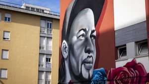 Mural de homenagem a Odair Moniz, natural de Cabo Verde e imigrante em Portugal, que foi alvejado por um agente da Polícia de Segurança Pública (PSP) a 21 de outubro de 2024, com a inauguração de um mural, um almoço comunitário e concertos, no Bairro do Zambujal, Amadora, 18 de outubro de 2025. JOSÉ SENA GOULÃO/LUSA