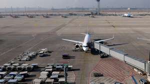 epa11953346 A grounded airplane at an empty terminal of the Berlin-Brandenburg airport, in Schönefeld, Germany, 10 March 2025. The United Services Trade Union (ver.di) is calling for an all-day warning strike at several German airports on 10 March 2025, for employees in the aviation security sector who work in passenger, personnel, goods and cargo screening, as well as in service areas.  EPA/FILIP SINGER