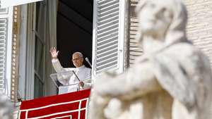 epa12498773 Pope Leo XIV leads the Angelus prayer from the window of his office overlooking Saint Peter's Square, in Vatican City, 02 November 2025.  EPA/FABIO FRUSTACI
