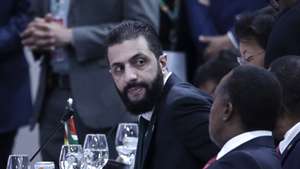 epa12508007 Syrian President Ahmed al-Sharaa attends the opening of the COP30 leaders' summit at the Hangar Convention Center in Belem, Brazil, 06 November 2025. The leaders’ summit at the UN Climate Conference (COP30) kicked off in the Brazilian Amazon, with around 60 heads of state and government in attendance, seeking to lay the groundwork for negotiators.  EPA/ANDRE COELHO