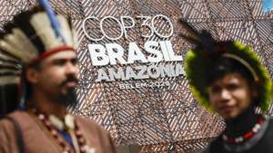 epa12518811 Indigenous people from the Pataxo tribe, from the state of Bahia, attend COP30 in Belem, Brazil, 11 November 2025. Representatives from some 170 countries are participating in the 30th United Nations Climate Change Conference, COP30, which will run until November 21.  EPA/Andre Coelho