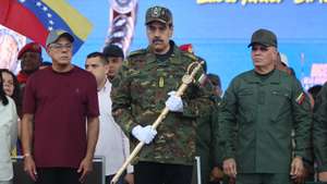 epa12548971 Venezuelan President Nicolas Maduro holds the Sword of Peru during an event marking the bicentennial of its delivery to Simon Bolivar, in Caracas, Venezuela, 25 November 2025.  EPA/MIGUEL GUTIERREZ