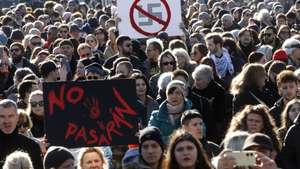 epaselect epa12559574 People hold placards during the 'United Against Fascism' rally in Zagreb, Croatia, 30 November 2025. The protest was organized by the Zagreb Anti-Fascist Network and Factiv in Zagreb,Pula, Rijeka and Zadar.  EPA/ANTONIO BAT