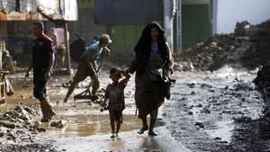 epa12561910 Residents clean up their houses from the mud in a flood-affected village in the Meureudu area, Pidie Jaya Aceh, Indonesia, 01 December 2025. According to National Disaster Management Agency Floods and landslides triggered by Tropical Cyclone Senyar have killed at least 442 people across Aceh, North Sumatra, and West Sumatra provinces. This number is expected to rise, as approximately 402 people remain uncounted for.  EPA/HOTLI SIMANJUNTAK