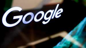 epa12518669 Google logo is seen during a press conference held by Google on the investment plan for Germany, in Berlin, Germany 11 November 2025.  EPA/Filip Singer